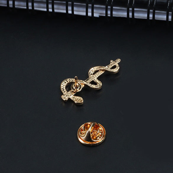 Broche Caducée au serpent unique dorée sur fond verso